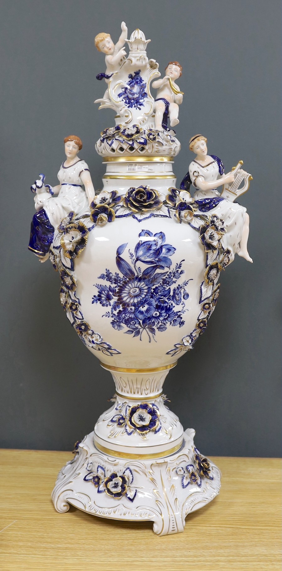 A large and impressive gilt blue and white Dresden lidded urn on stand - 77cm high